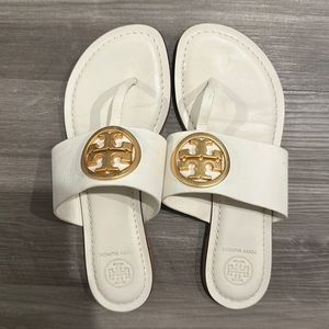 Tory Burch sandals.